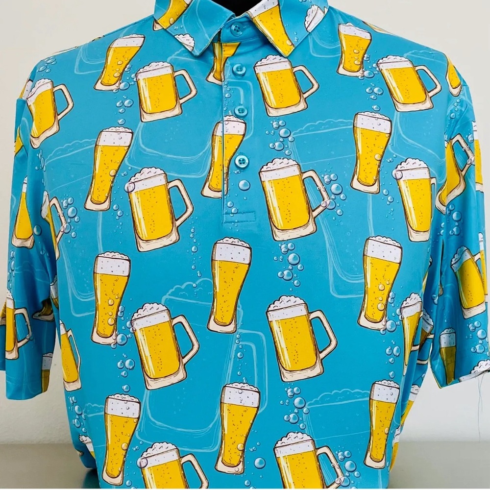 Coby Steven’s blue beer print golf polo